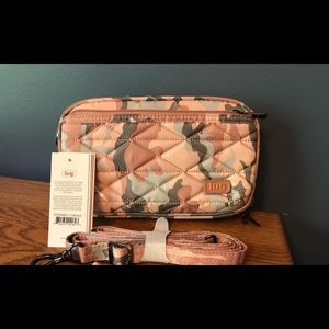 Lug Brand NWT Roundabout 2 in Camo Rose. Includes strap but not wristlet.